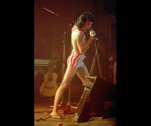 Freddie Mercury, leading his band Queen.