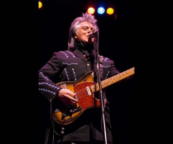 Marty Stuart with Clarence White's famous B Bender guitar.