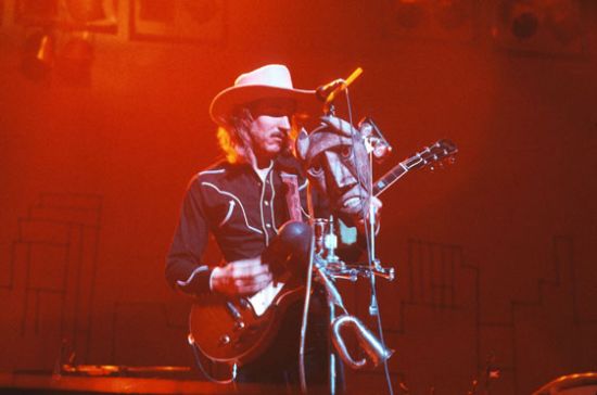 Joe Walsh, with a few toys on the microphone stand.